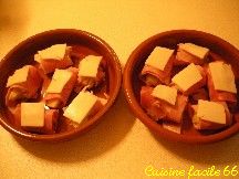 Cœur d’artichauts en petits roulés au jambon en gratin