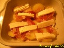 Pommes de terre gratinées au jambon Serrano, tomme fraîche et palet des Pyrénées