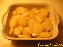 Pommes de terre gratinées au jambon Serrano, tomme fraîche et palet des Pyrénées